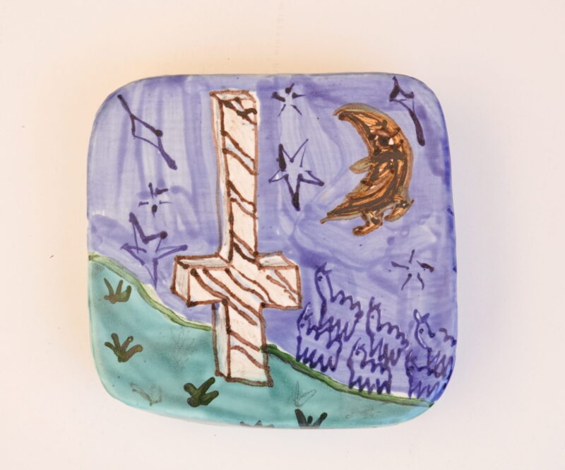 Cross leading to the church in Pustec